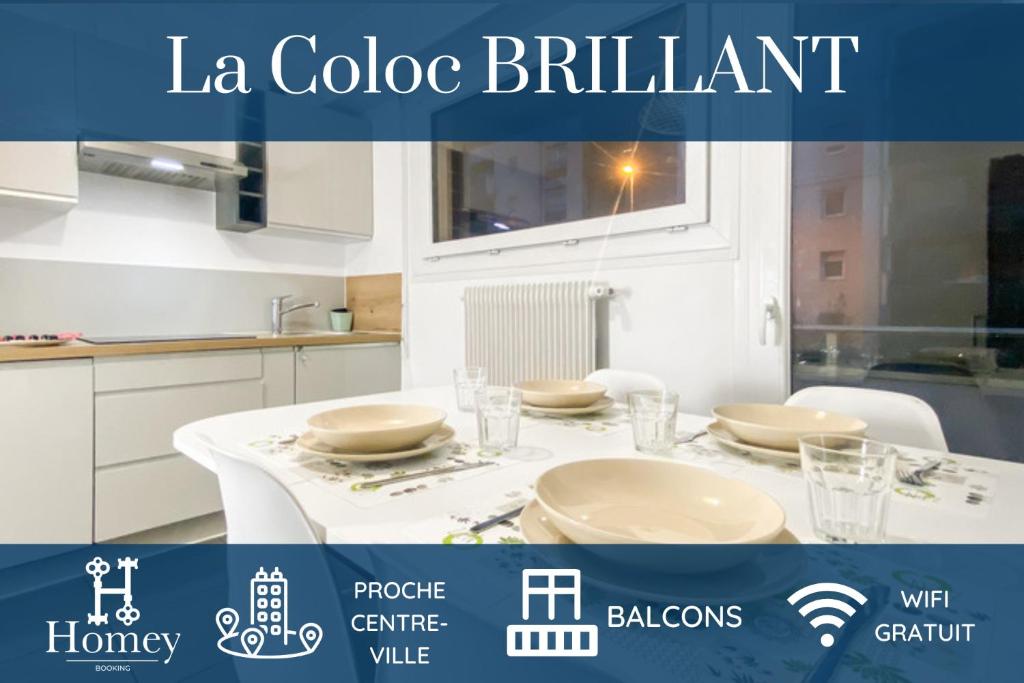 安纳马斯HOMEY LA COLOC BRILLANT - Colocation haut de gamme de 3 chambres uniques et privées / Proche centre-ville et transports en commun / Balcons / Wifi gratuit的白色的厨房,配有桌子和盘子