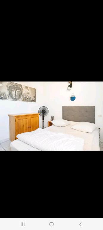 Villa 6 couchages spa privatif, accès direct mer, piscine客房内的一张或多张床位