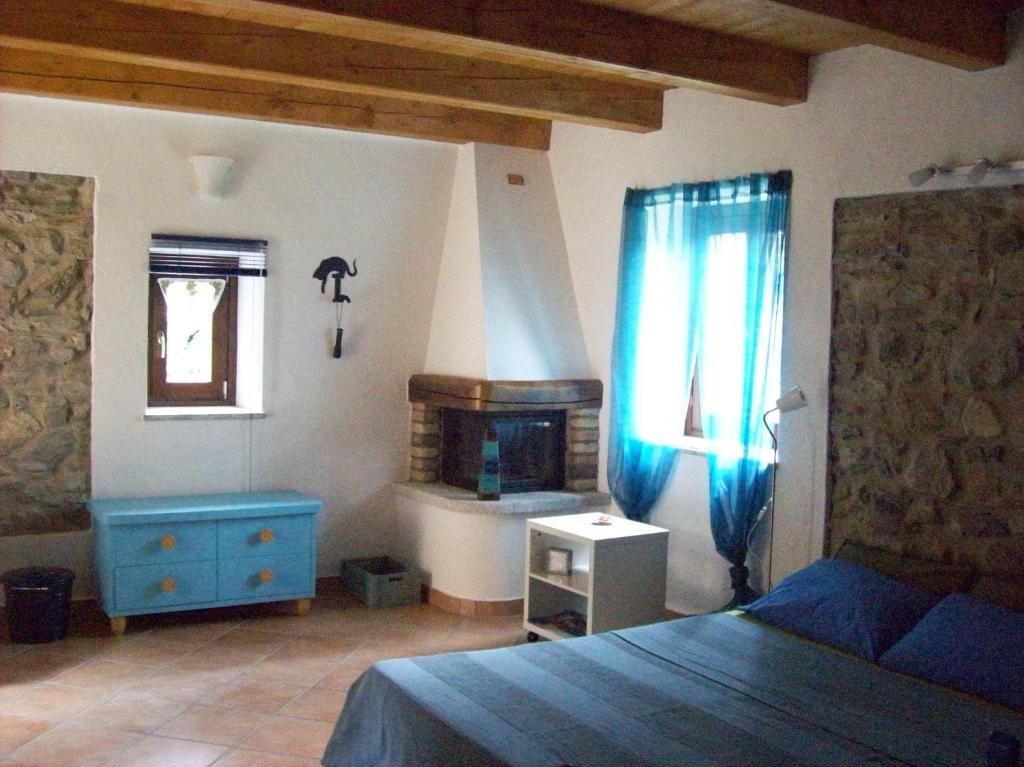Appartamenti Cà di pom客房内的一张或多张床位
