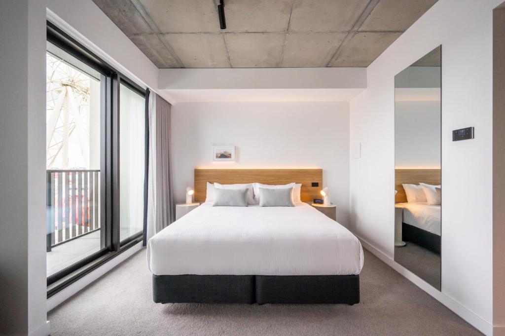 Nesuto Docklands客房内的一张或多张床位
