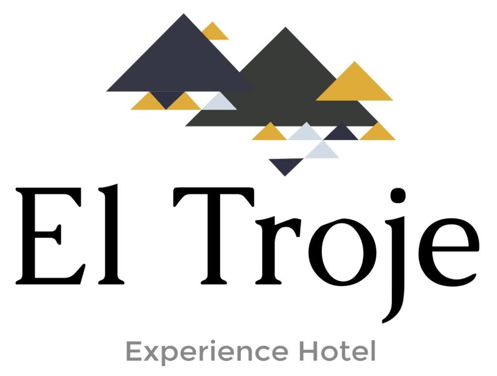里奥班巴Hostería El Troje Experience的一张El fiore体验酒店标志的图片