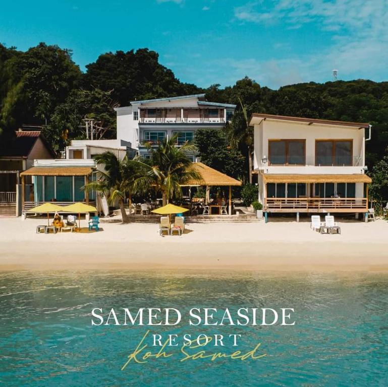 沙美岛Samed Seaside Resort - เสม็ด ซีไซด์ รีสอร์ท的海边的建筑