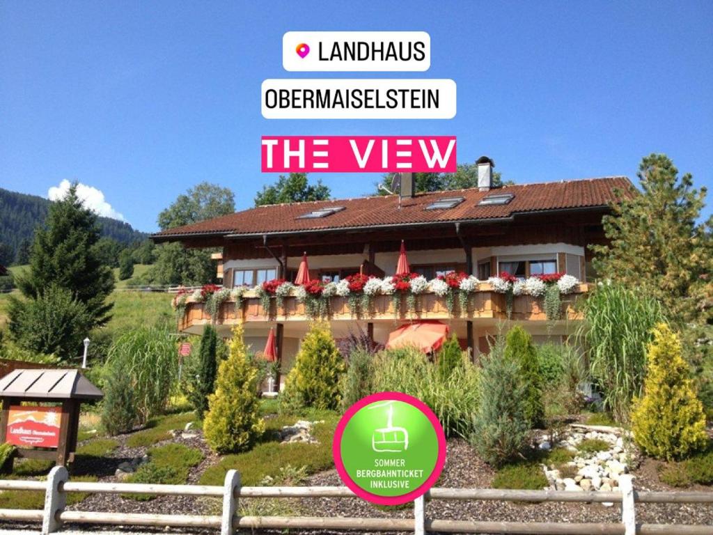 上迈塞尔施泰因Landhaus Obermaiselstein "THE VIEW"的带有阅读视图标志的房屋