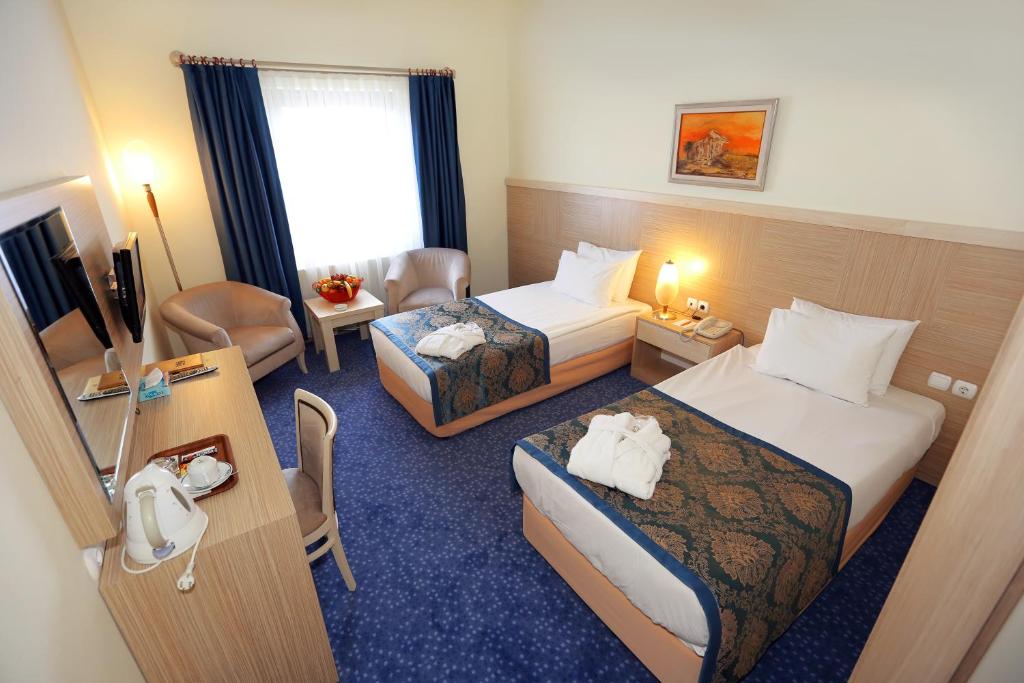 坎卡亚国王酒店客房内的一张或多张床位