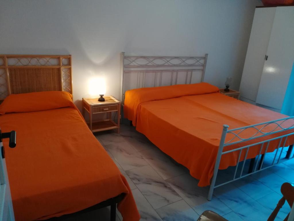 Le Querce Santa Cesarea Terme客房内的一张或多张床位