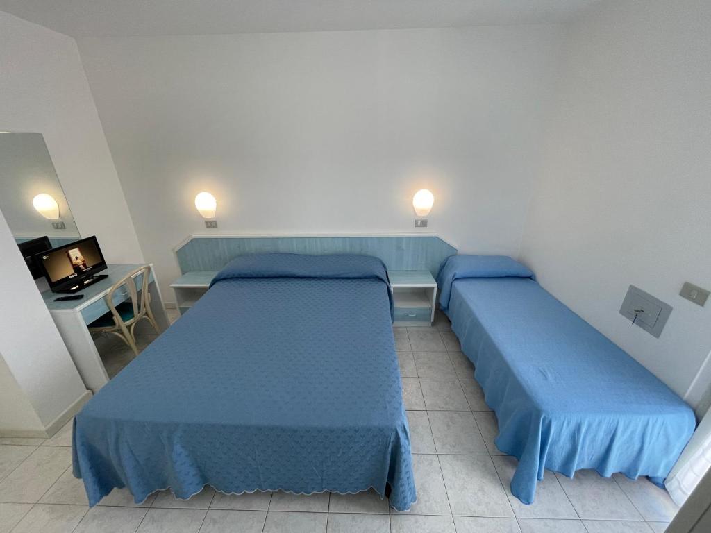 Albergo Désirée客房内的一张或多张床位