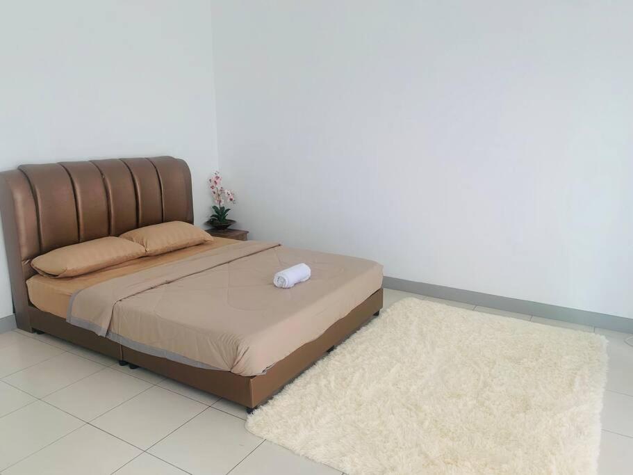 Dedaun Homestay Batu Pahat客房内的一张或多张床位