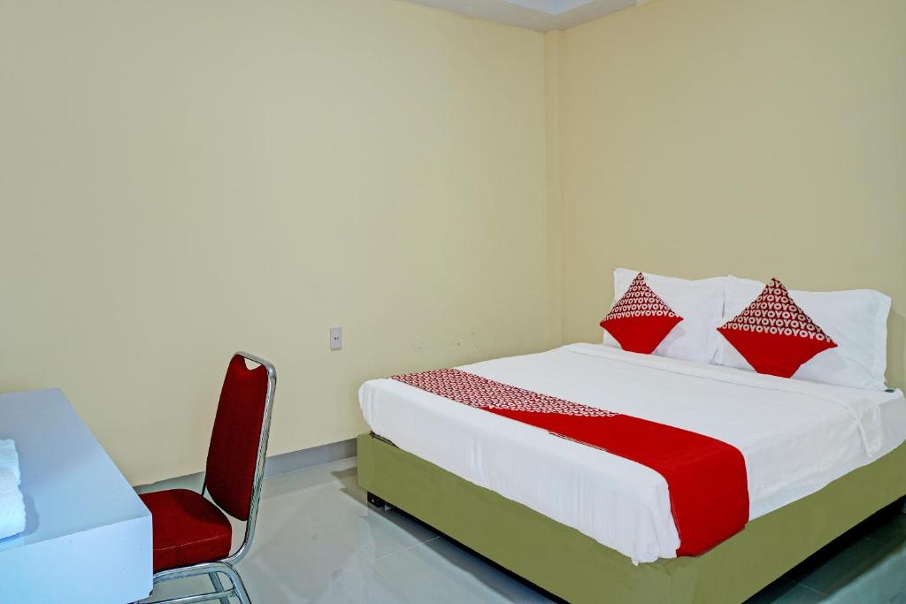 Capital O 92364 Hotel Anugerah Soambaton Resto & Waterboom客房内的一张或多张床位