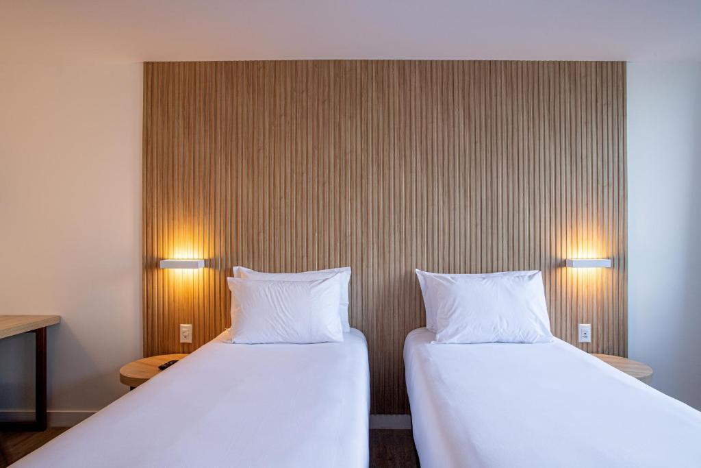 Sooz Hotel Collection客房内的一张或多张床位