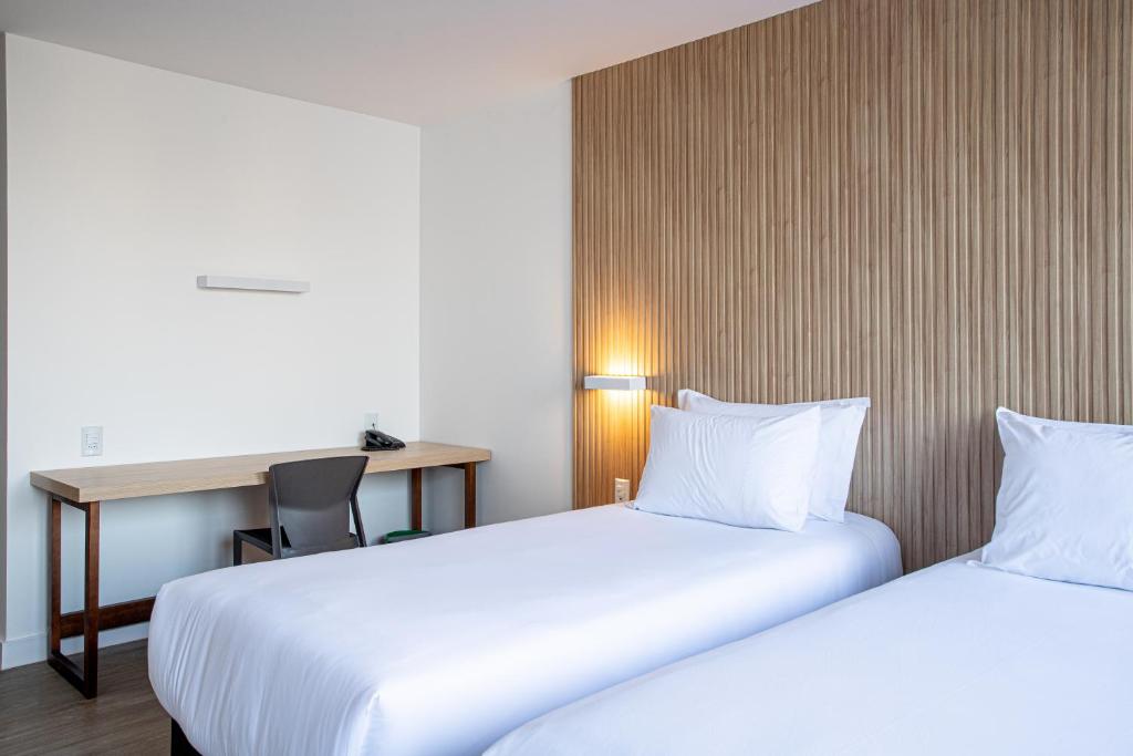 Sooz Hotel Collection客房内的一张或多张床位