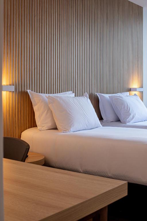 Sooz Hotel Collection客房内的一张或多张床位