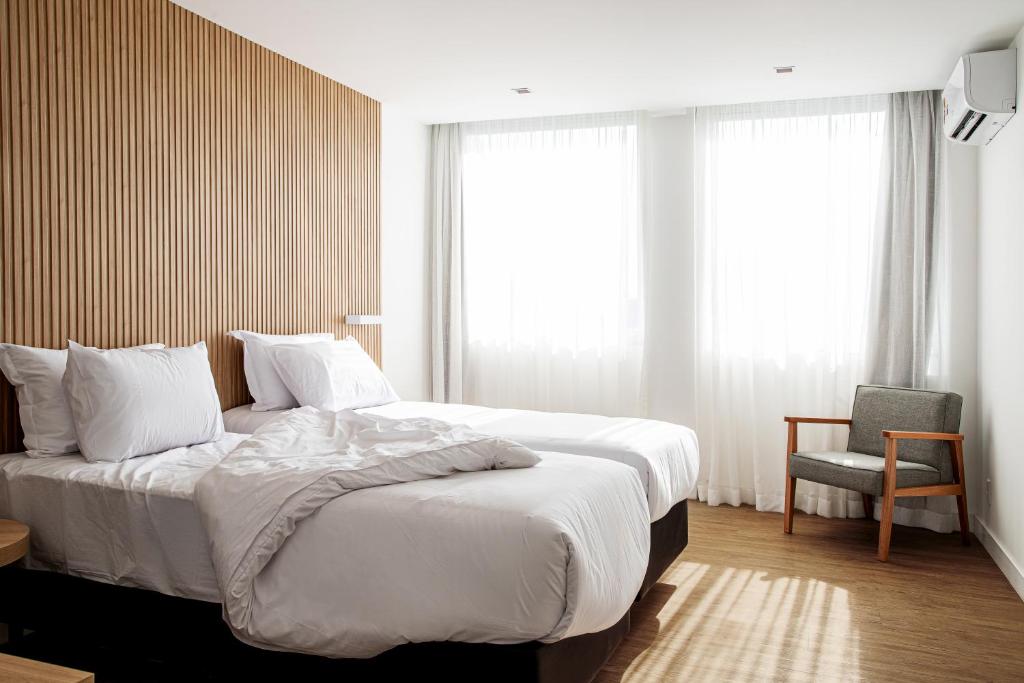 Sooz Hotel Collection客房内的一张或多张床位
