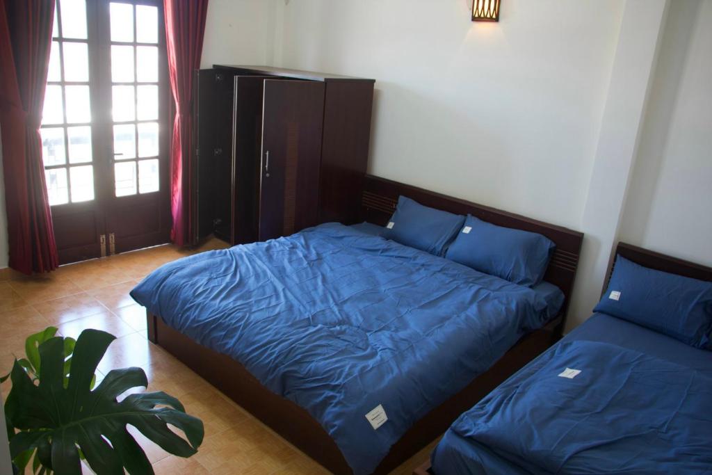 NHỚ House IV客房内的一张或多张床位