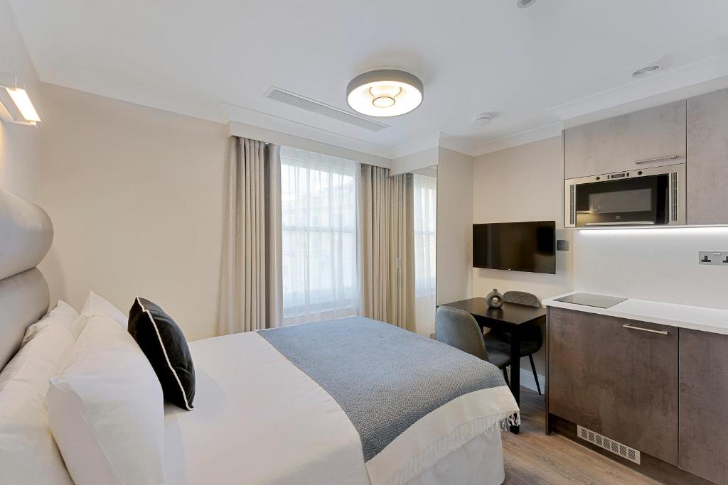 Cleveland Residences Paddington的电视和&#47;或娱乐中心