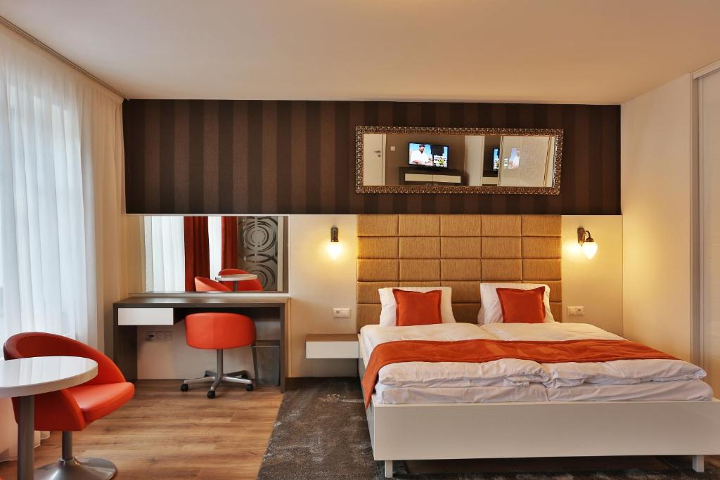 贵宾公寓式酒店客房内的一张或多张床位
