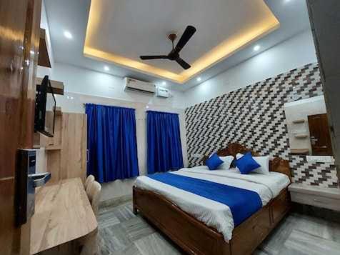 OYO Hotel Rajeshwari Plaza客房内的一张或多张床位