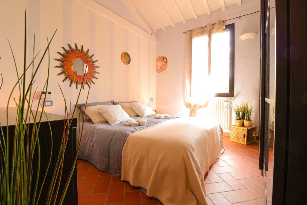 Casale Val D' ORCIA- Relax e lusso in Piscina客房内的一张或多张床位