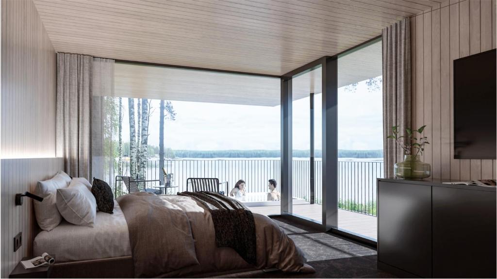 普马拉Sahanlahti Resort的一间卧室设有一张床和一个大型玻璃窗