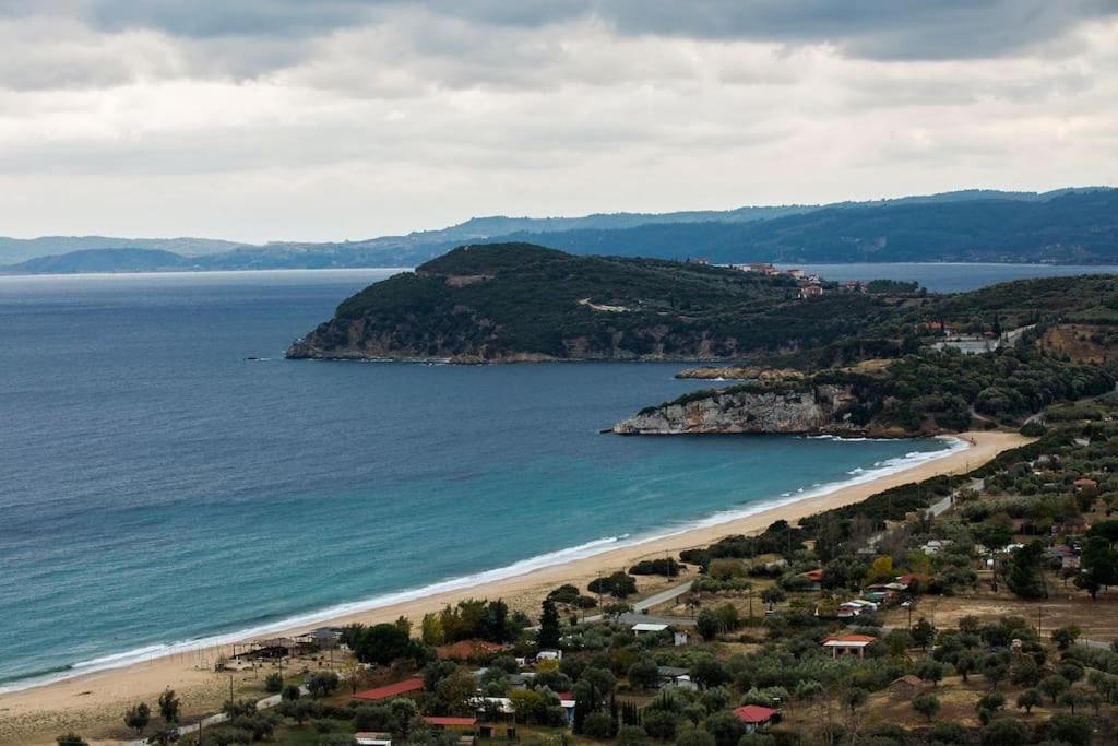 皮加迪卡Petrini Spiti的享有海滩和海洋的空中景致