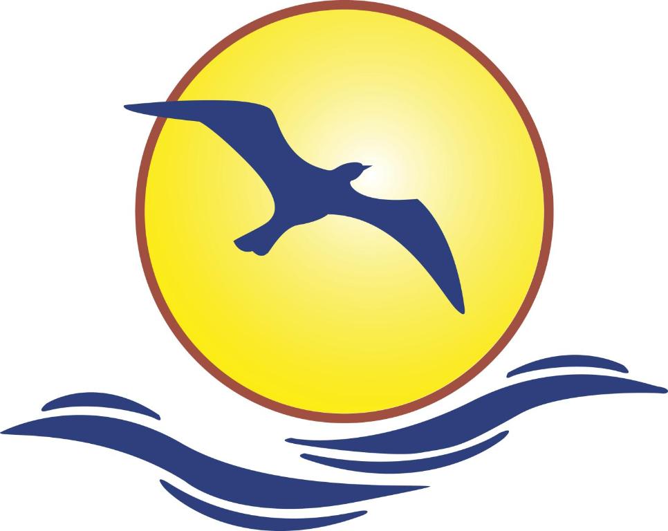 道格拉斯Sea Breeze Guest House的鸟儿飞过水面的象征