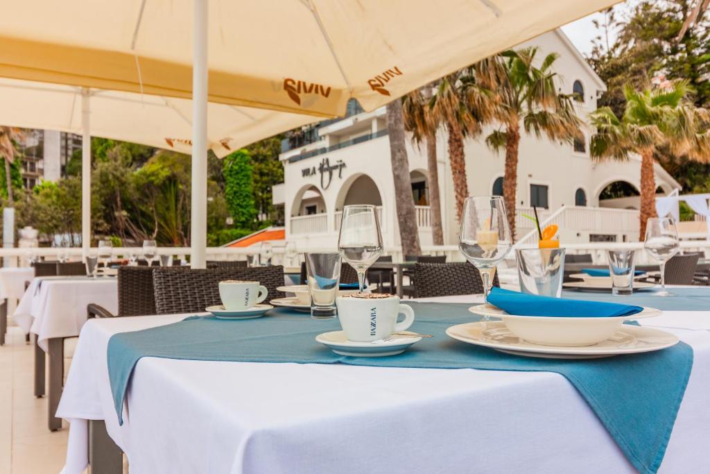 Hotel Vila Hedonija餐厅或其他用餐的地方