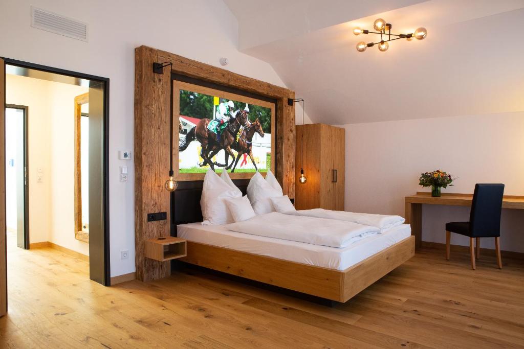 EmmeringGasthof & Hotel Bichler的卧室配有一张床,马从窗户跳出来