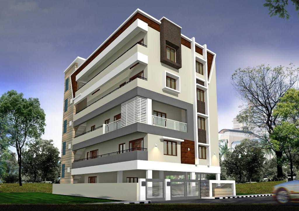 蒂鲁帕蒂SLS HOMESTAY - Luxury AC Service Apartments 1BHK, 2BHK, 3BHK - Direct Flyover to Alipiri Tirumala Gate - Walk to PS4 Pure Veg Restaurants, Supermarkets - Near to National Highway & Padmavathi Amma Temple - Modular Kitchen, Living room -Free Superfast Wifi的白色建筑的 ⁇ 染