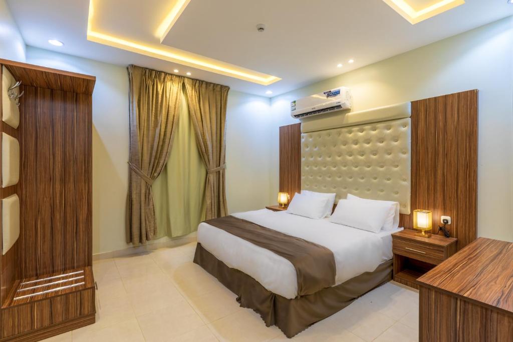艾卜哈ساوث ستار的酒店客房,配有床和电视