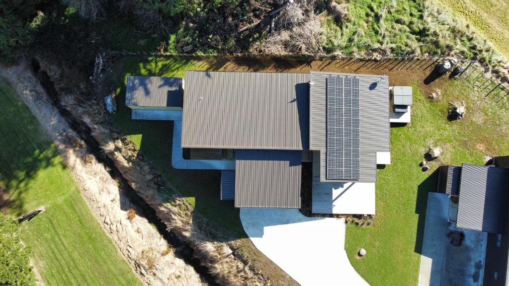 奥阿库尼5 Bedroom, Solar on Snowmass Ohakune, Yellow Door的建筑在外地的架空图