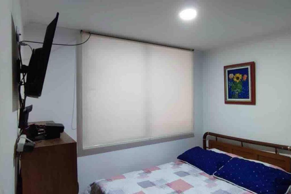 Apartamento para turismo en Chiquinquirá客房内的一张或多张床位