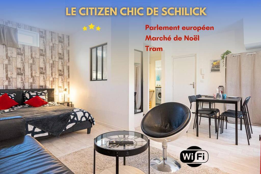 希尔蒂盖姆* Le Citizen Chic de Schilick *的卧室配有一张床和一张桌子及椅子