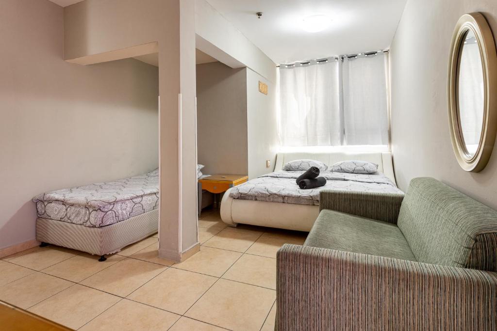 Little Prince Hostel-5 Min Walk To The Beach客房内的一张或多张床位