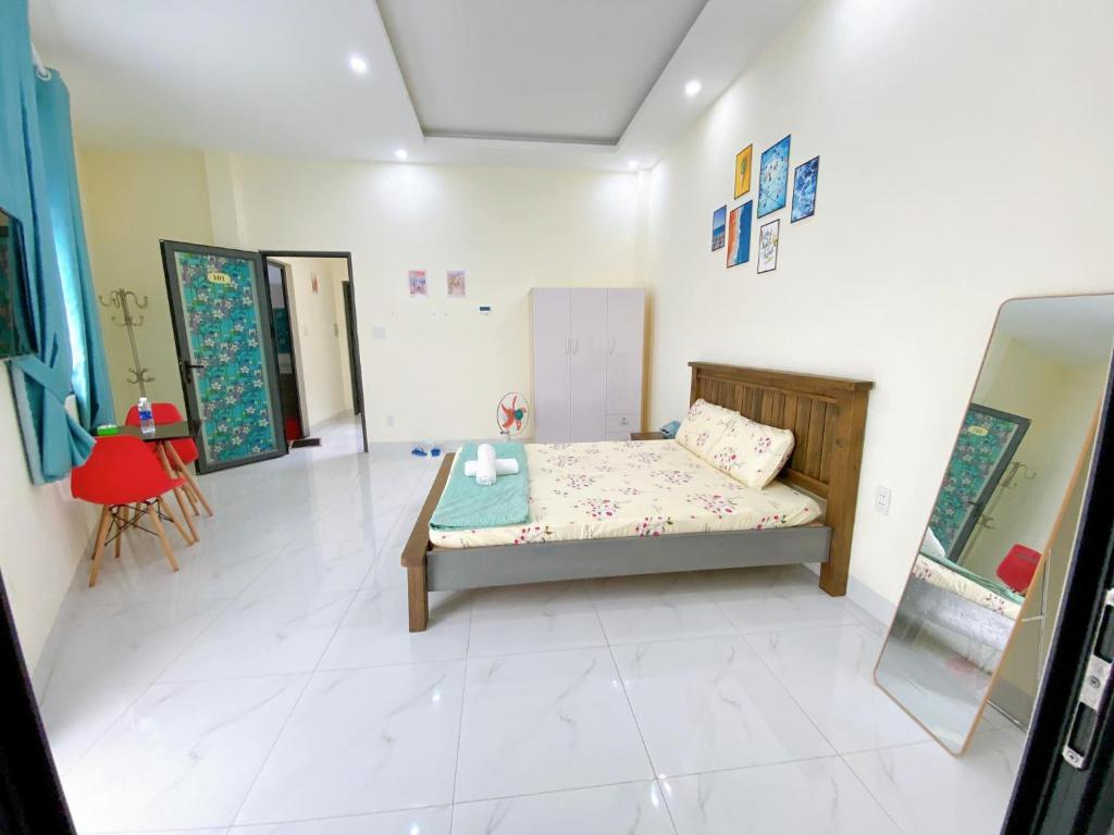 HOMESTAY HƯƠNG客房内的一张或多张床位