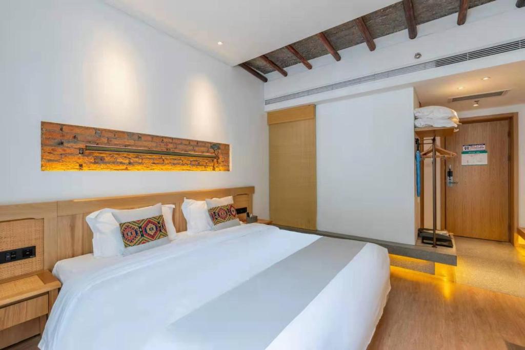Yoba Boutique Hotel客房内的一张或多张床位