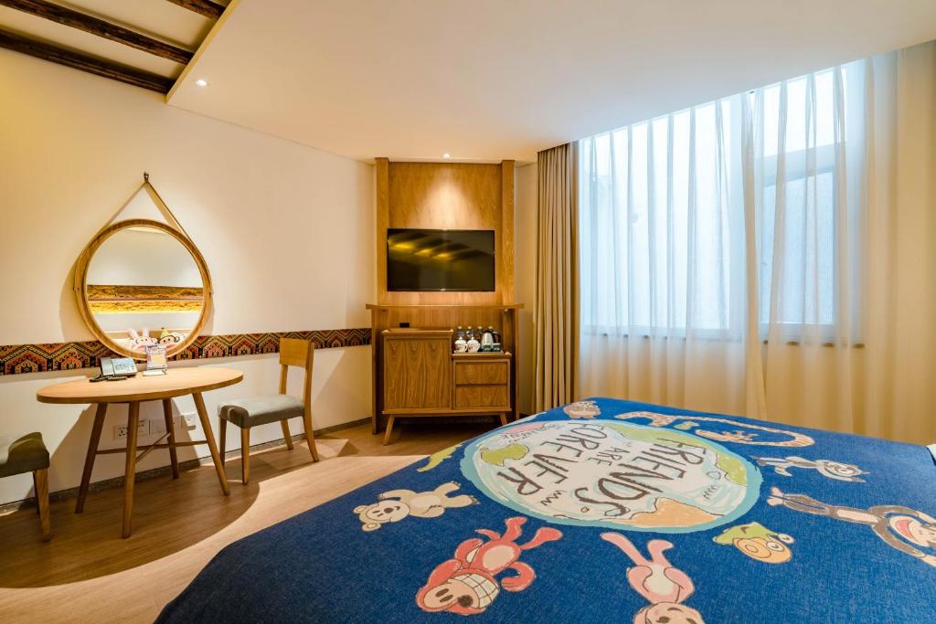 Yoba Boutique Hotel客房内的一张或多张床位