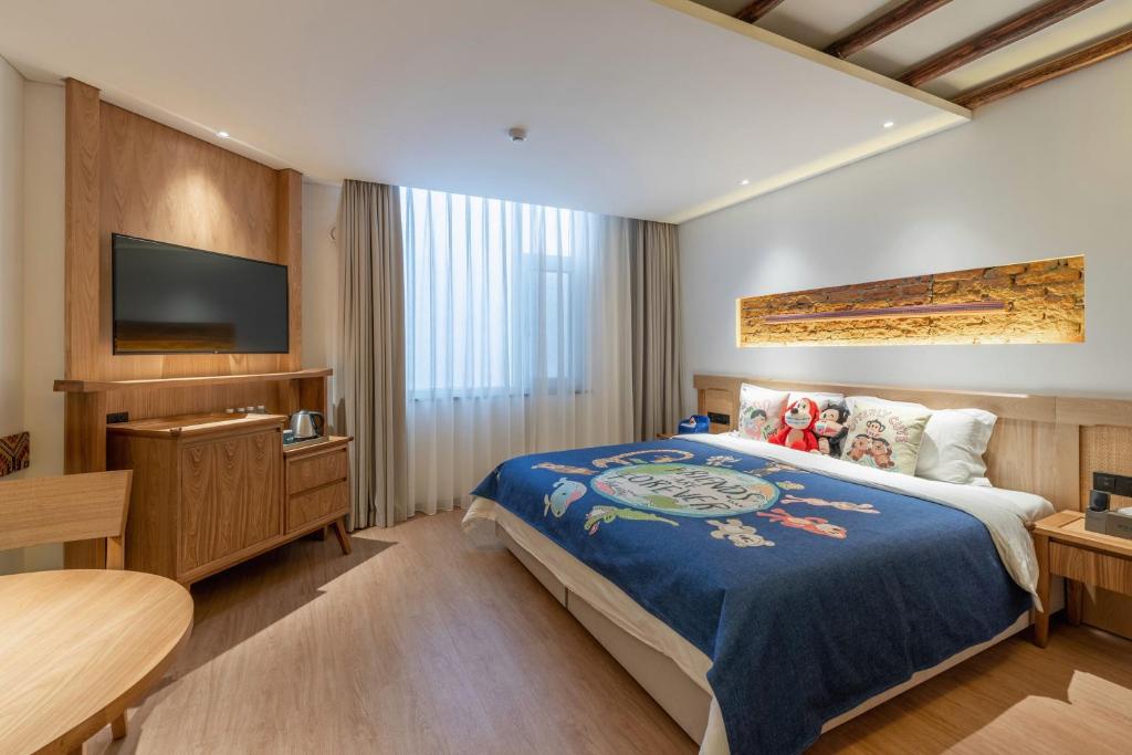 Yoba Boutique Hotel客房内的一张或多张床位