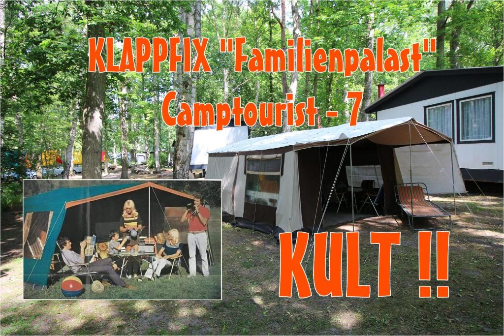 德兰斯克DDR Klappfix "FAMILIENPALAST" direkt am Strand的院子里一个家庭的帐篷的照片