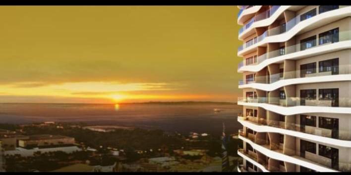 马尼拉Coast Residences Penthouse with skyline and manila bay view的享有建筑美景,享有日落美景