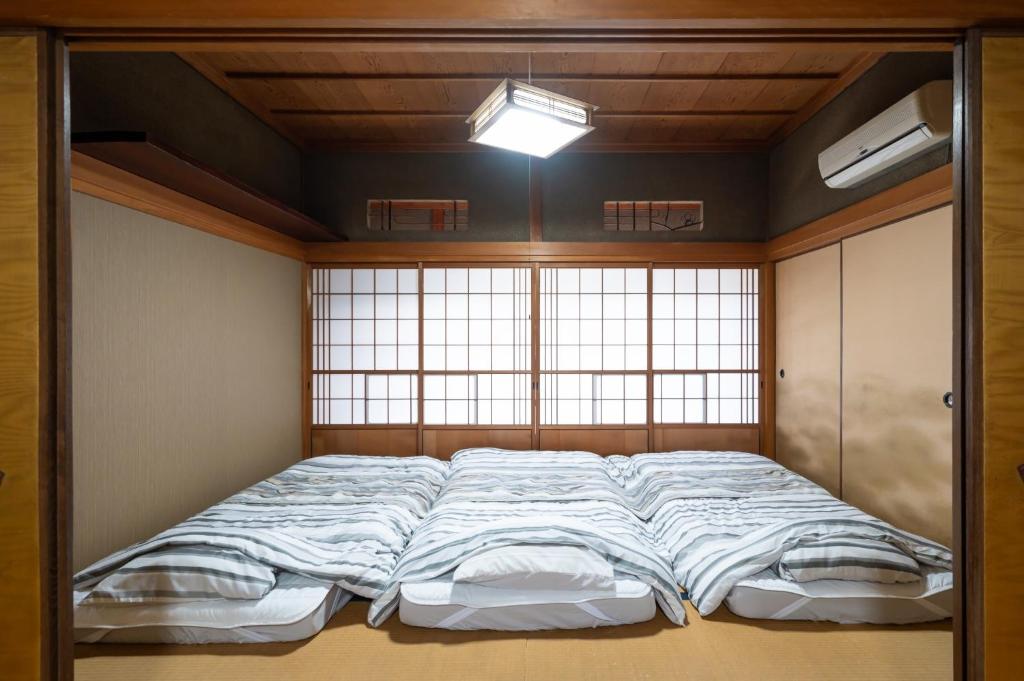 Chizu - Vacation STAY 83974v客房内的一张或多张床位
