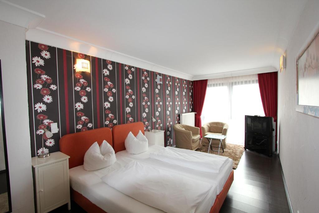 埃尔特格拉茨公寓式酒店客房内的一张或多张床位