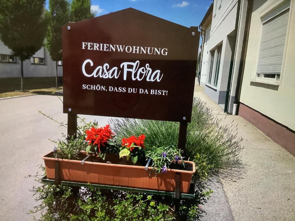 PamhagenFerienwohnung Casa Flora的列表中卡萨花卉站级的标志