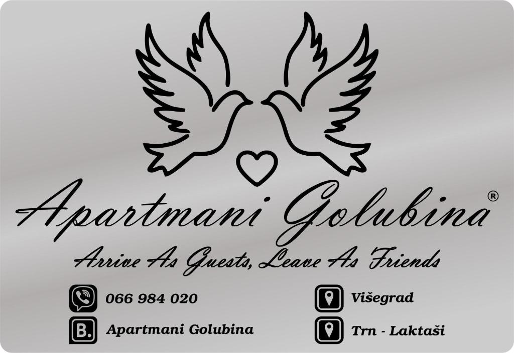 维舍格勒Apartmani Golubina - Visegrad的中间有一对心的翅膀