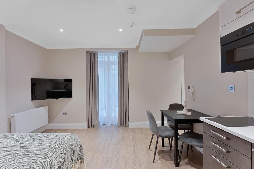 Cleveland Residences Paddington的电视和&#47;或娱乐中心
