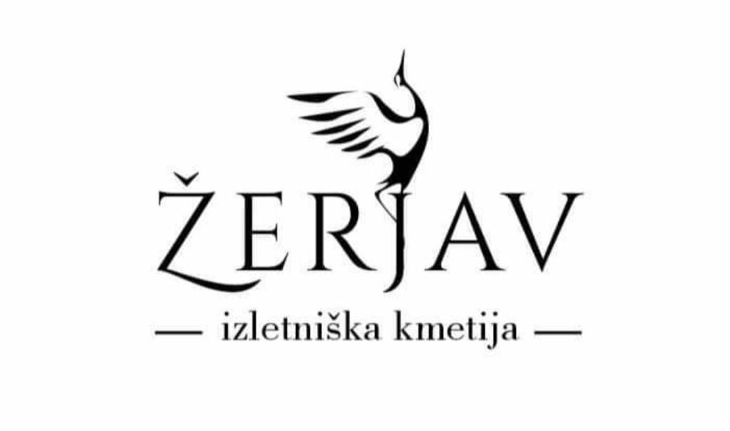 布雷日采Turistično - Izletniška kmetija Žerjav的zeria族裔实体的标志