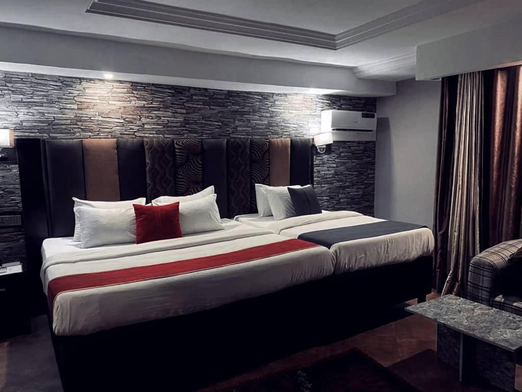 Shamrockmanor(TheResidence)客房内的一张或多张床位