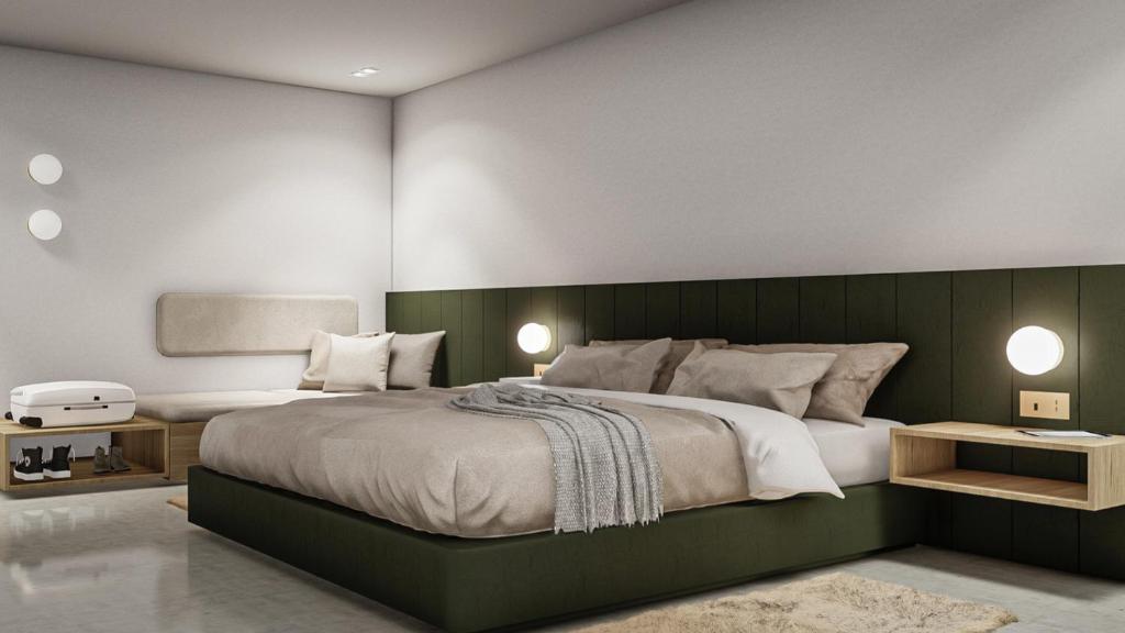 奥兰多Orlando Vitality Hotel的一间卧室配有一张大床和绿色床头板