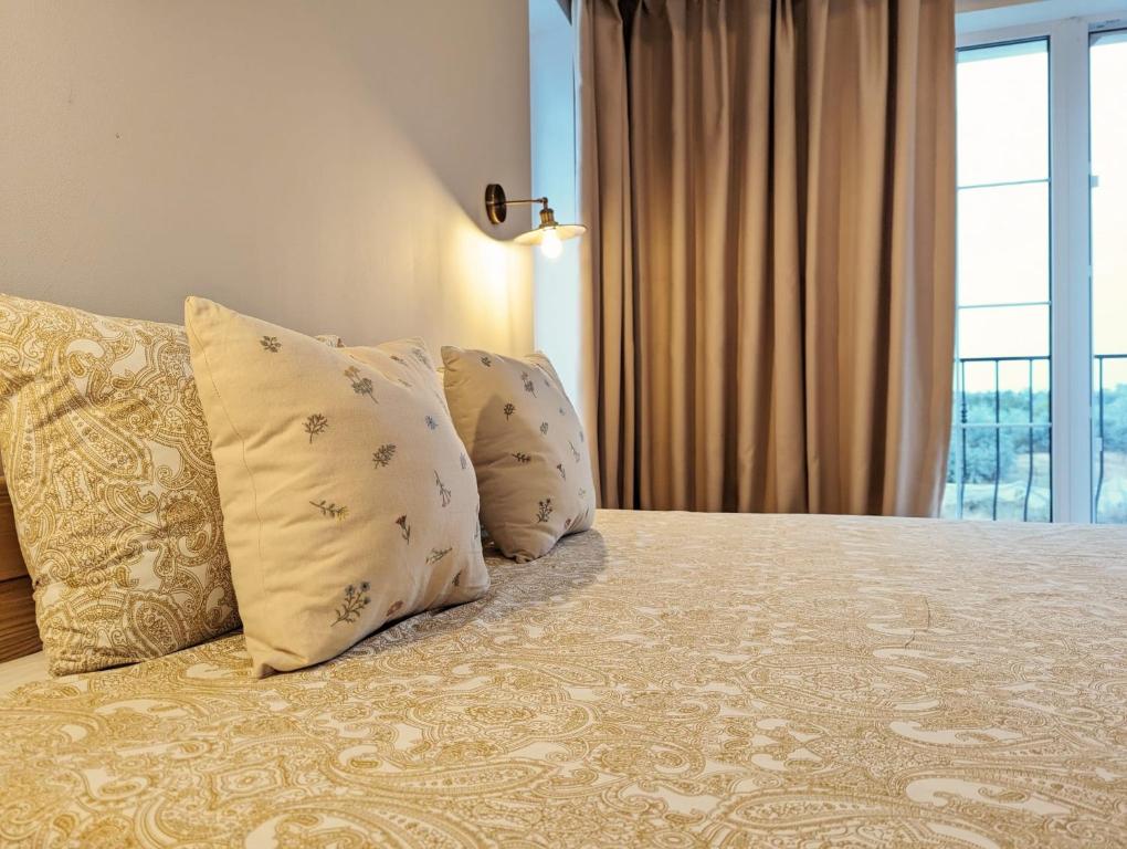 La Bella Villa Mamaia客房内的一张或多张床位