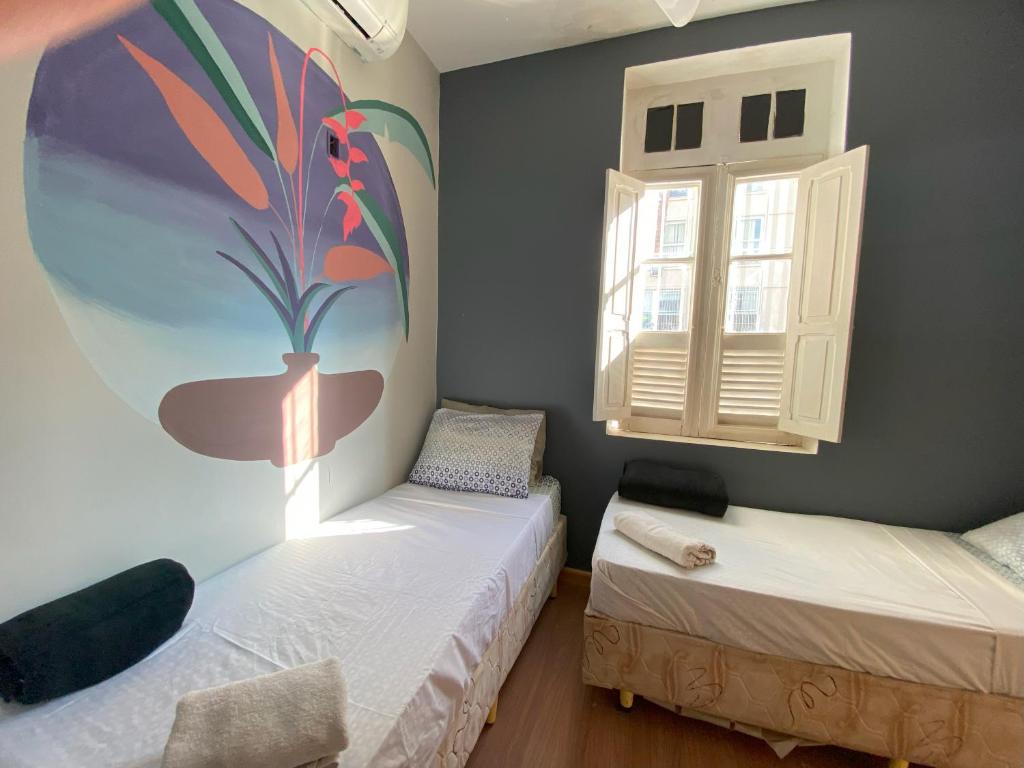 Aurora Hostel Rio客房内的一张或多张床位