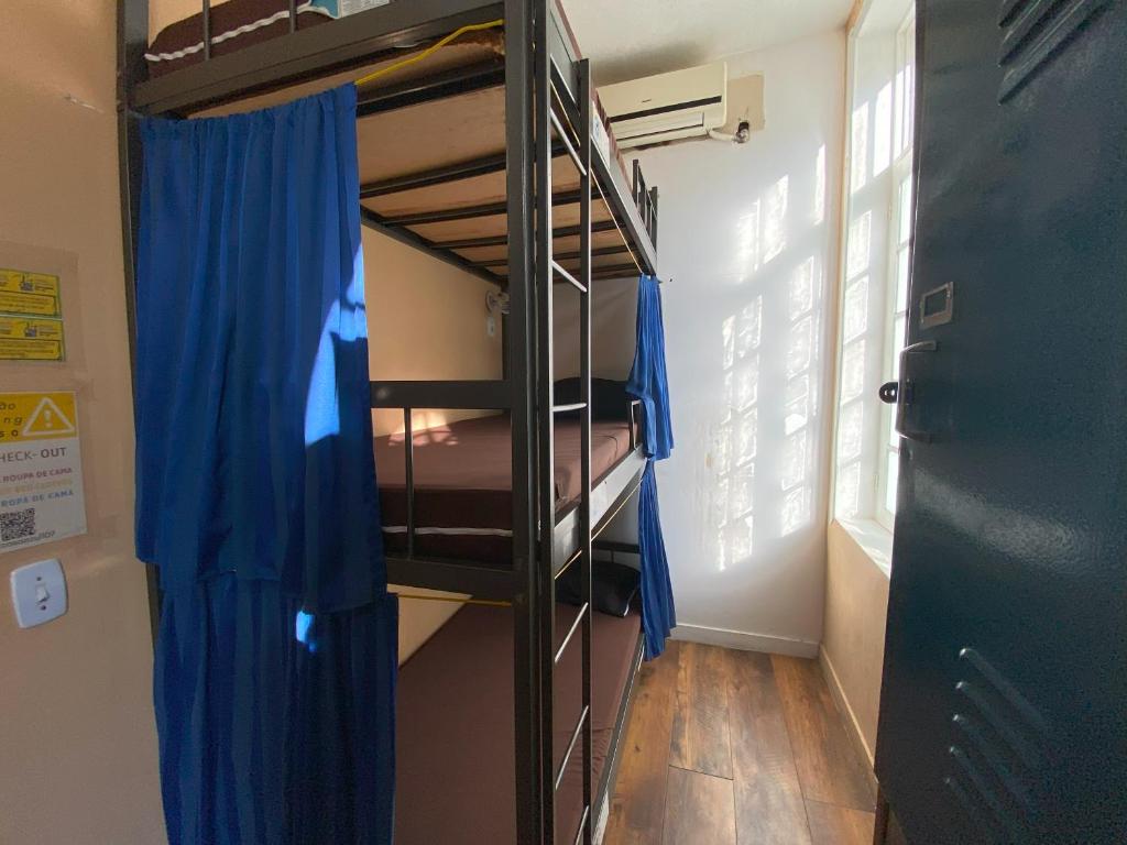 Aurora Hostel Rio客房内的一张或多张床位