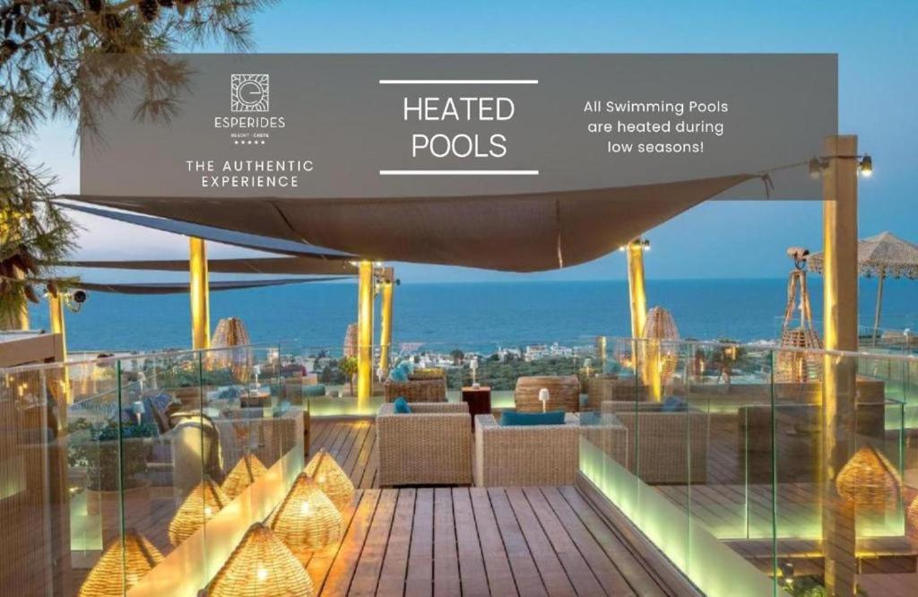 赫索尼索斯Esperides Resort Crete, The Authentic Experience的海景餐厅的标志